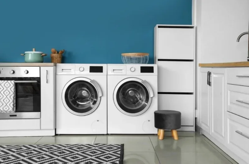 Laundry inspiration with storage and side-by-side appliances